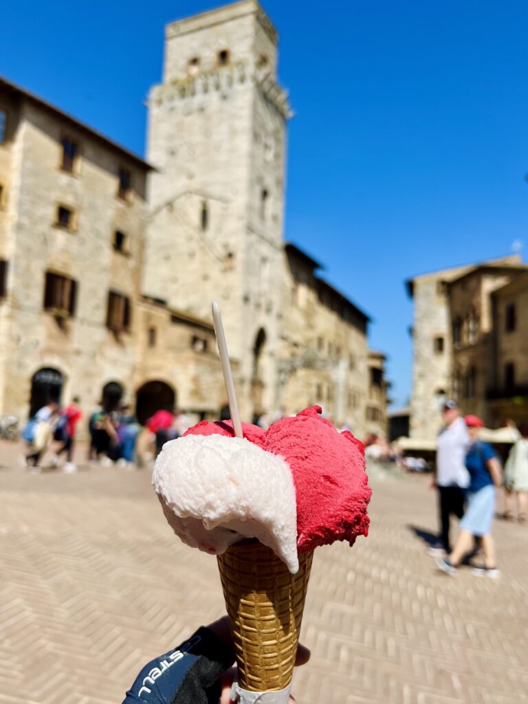 A gelato from Dondoli in San Gimignano with the tuscan towns famous towers in the background